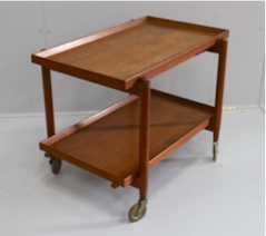 In the manner of Poul Hundevad, a mid century teak two tier tea trolley, width 75cm, depth 50cm, height 59cm